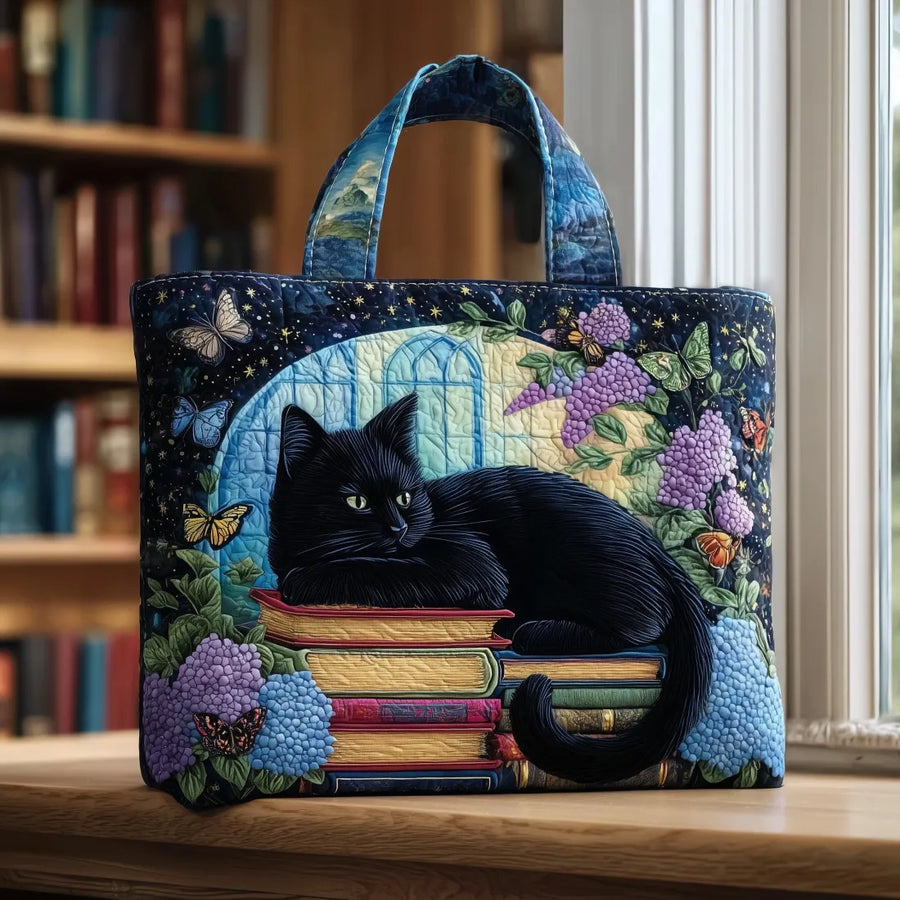 ROUSSEL PARIS | Sac artisanal Chat Noir parmi les livres